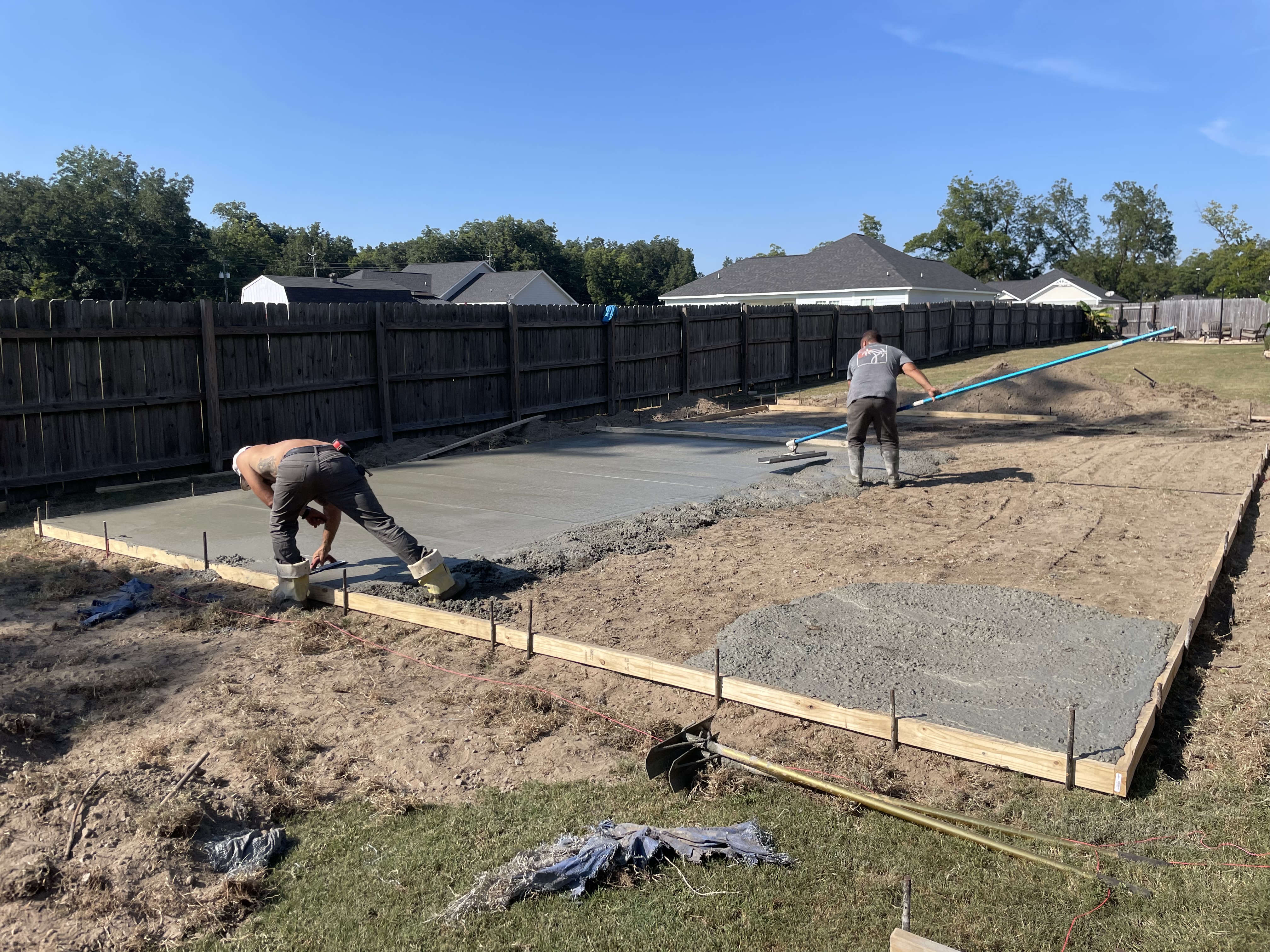 Next Level Concrete crew finishing a concrete slab